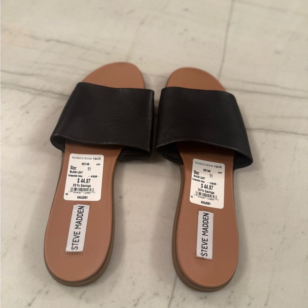 New. Steve Madden Black Leather Slides. New with tags.